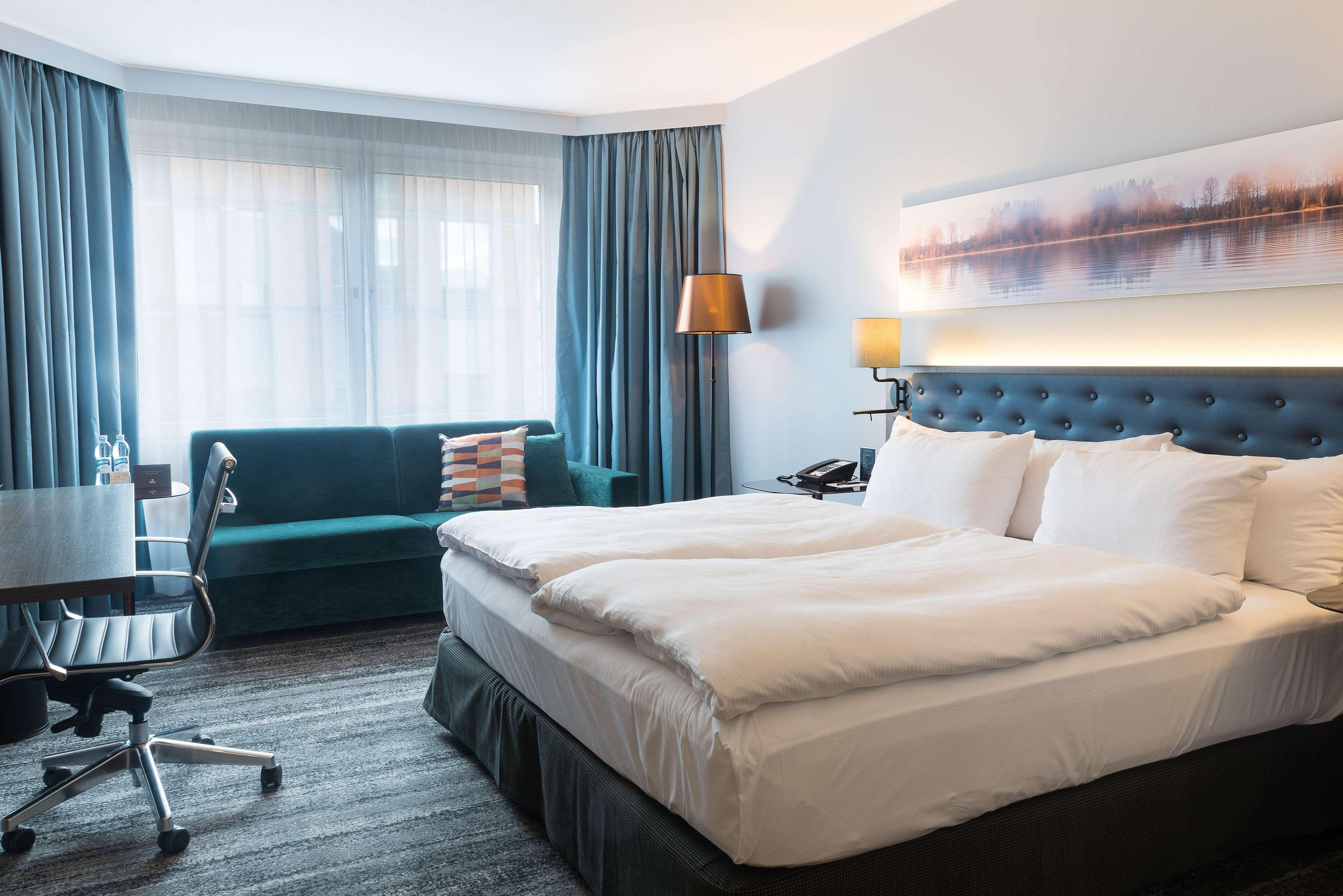 赫尔辛基斯特兰德希尔顿酒店 外观 照片 A room at the hotel