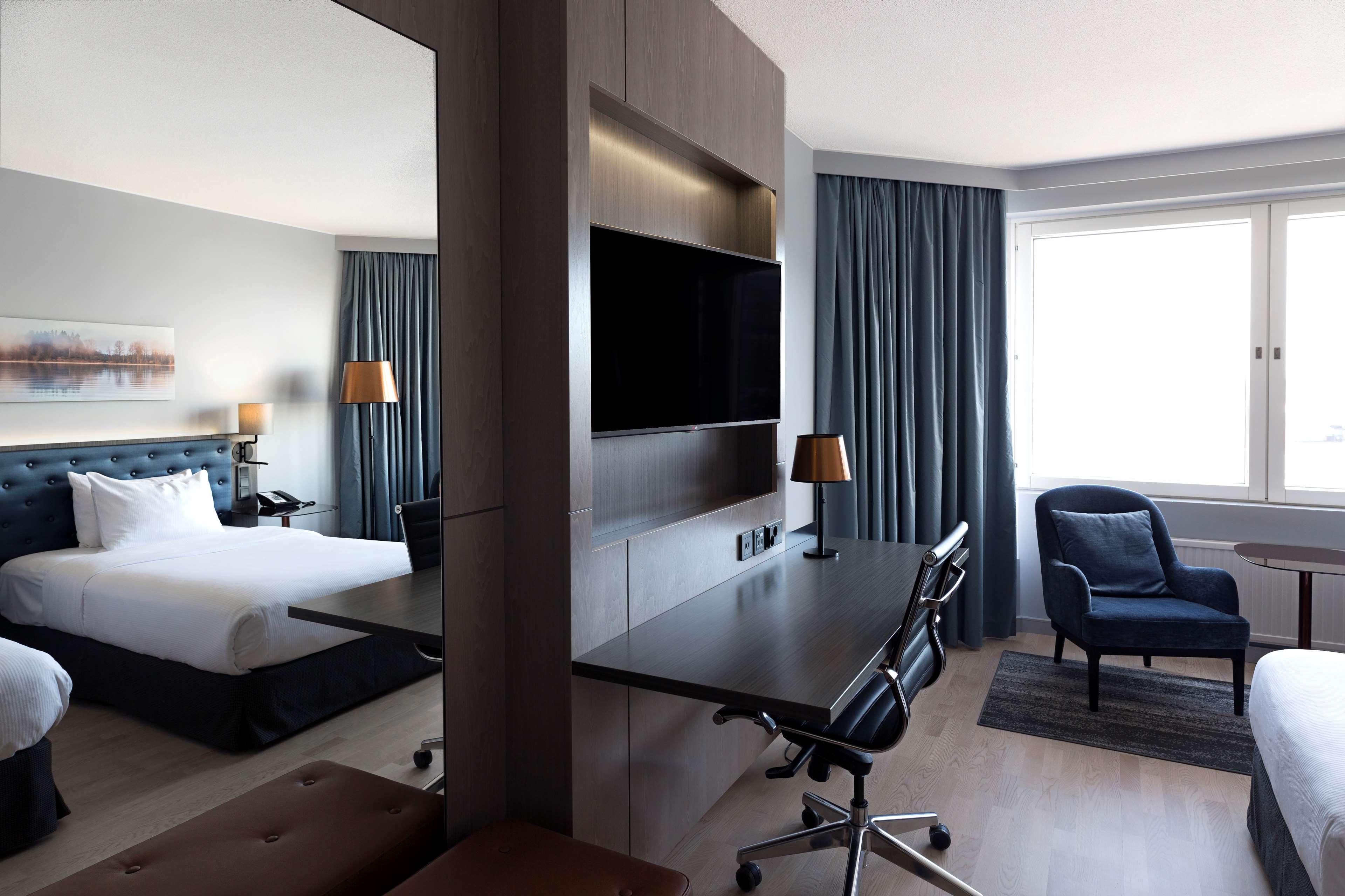 赫尔辛基斯特兰德希尔顿酒店 外观 照片 A room at the hotel