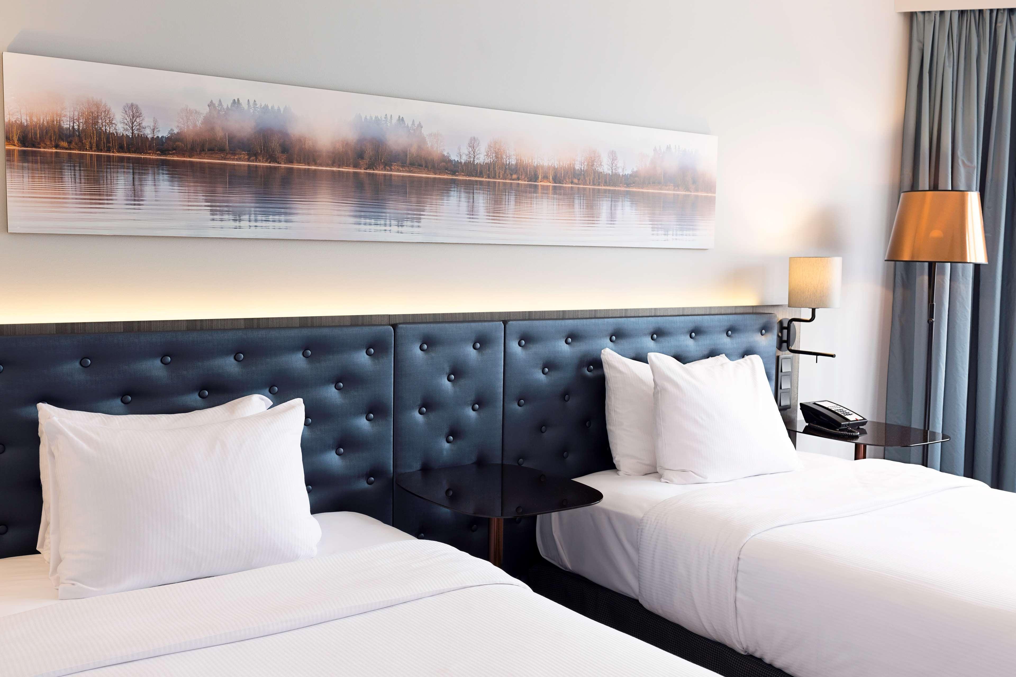 赫尔辛基斯特兰德希尔顿酒店 外观 照片 A room at the hotel
